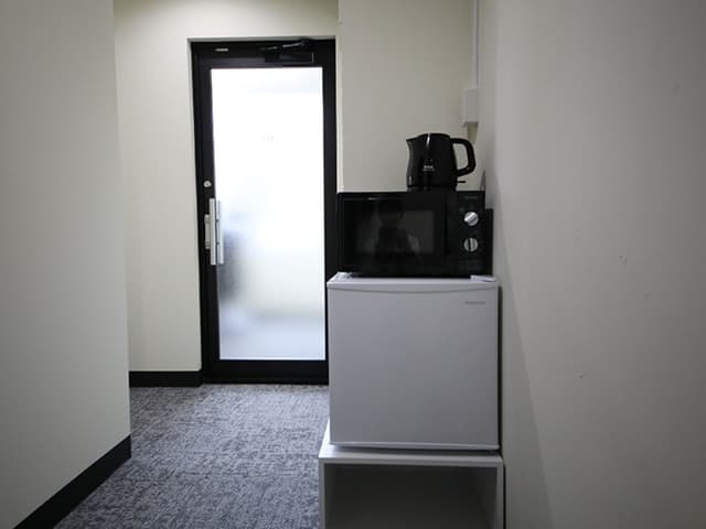 共用部_冷蔵庫・電子レンジ。共用部で利用可能です。